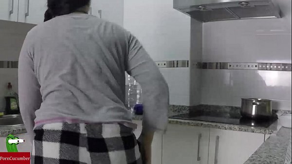 Fucking while making food in the kitchen